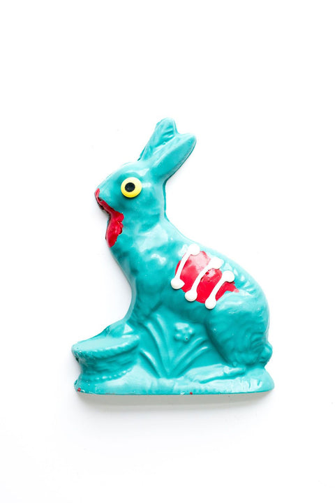 Handcrafted chocolate zombie bunny in teal with red and white spine-chilling details, perfect for Halloween celebrations.